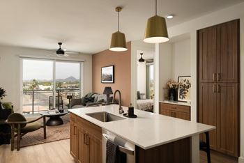 Quartz islands with accent pendant lighting